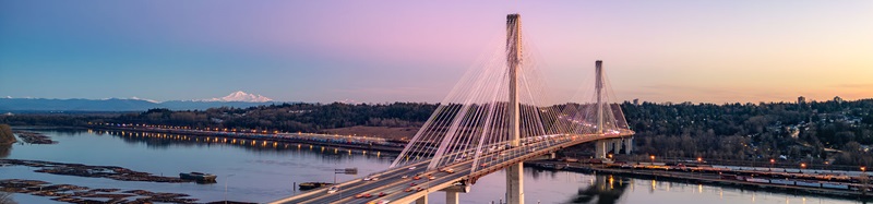 Port Mann Bridge across Fraser River. Sunset Sky. Vancouver, BC, Canada.