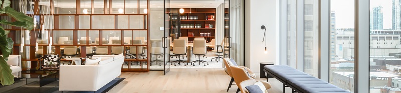 People interacting around boardroom table