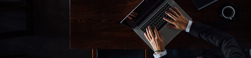 Person typing on laptop