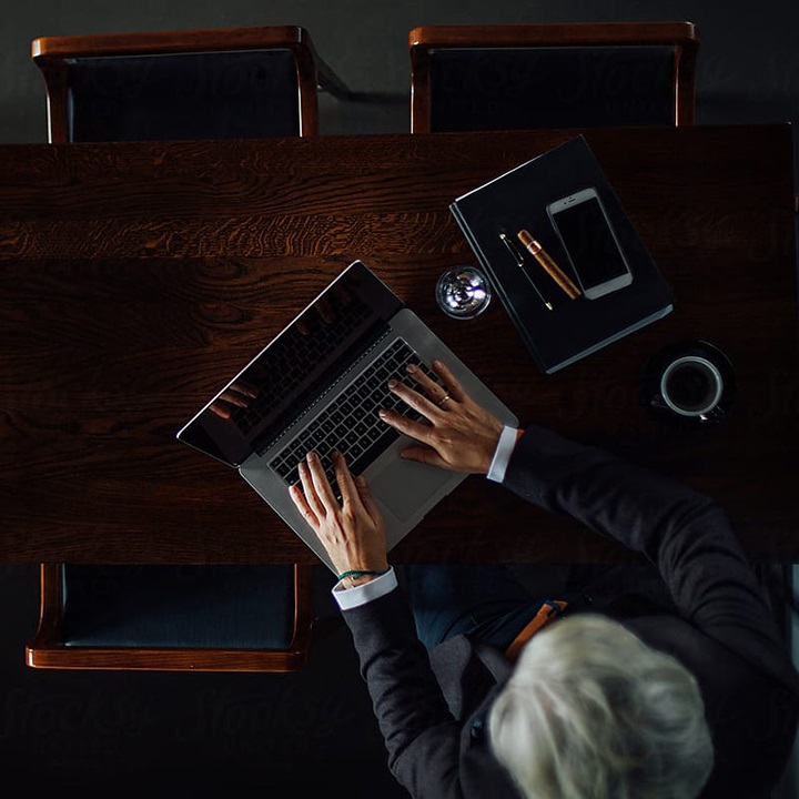 Person typing on laptop